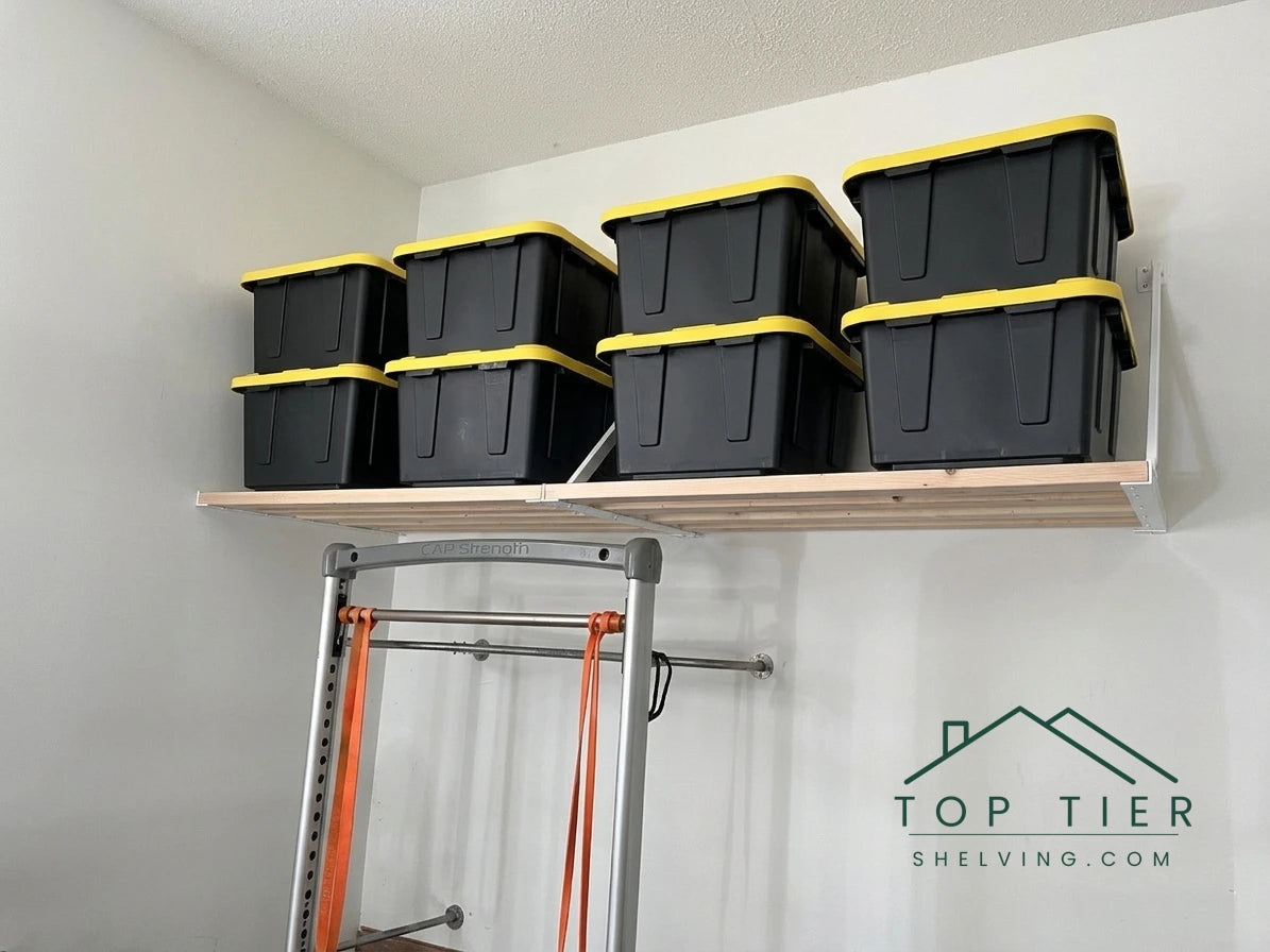 Garage shelving installation in Raleigh NC by Top Tier Shelving with storage above a weight rack