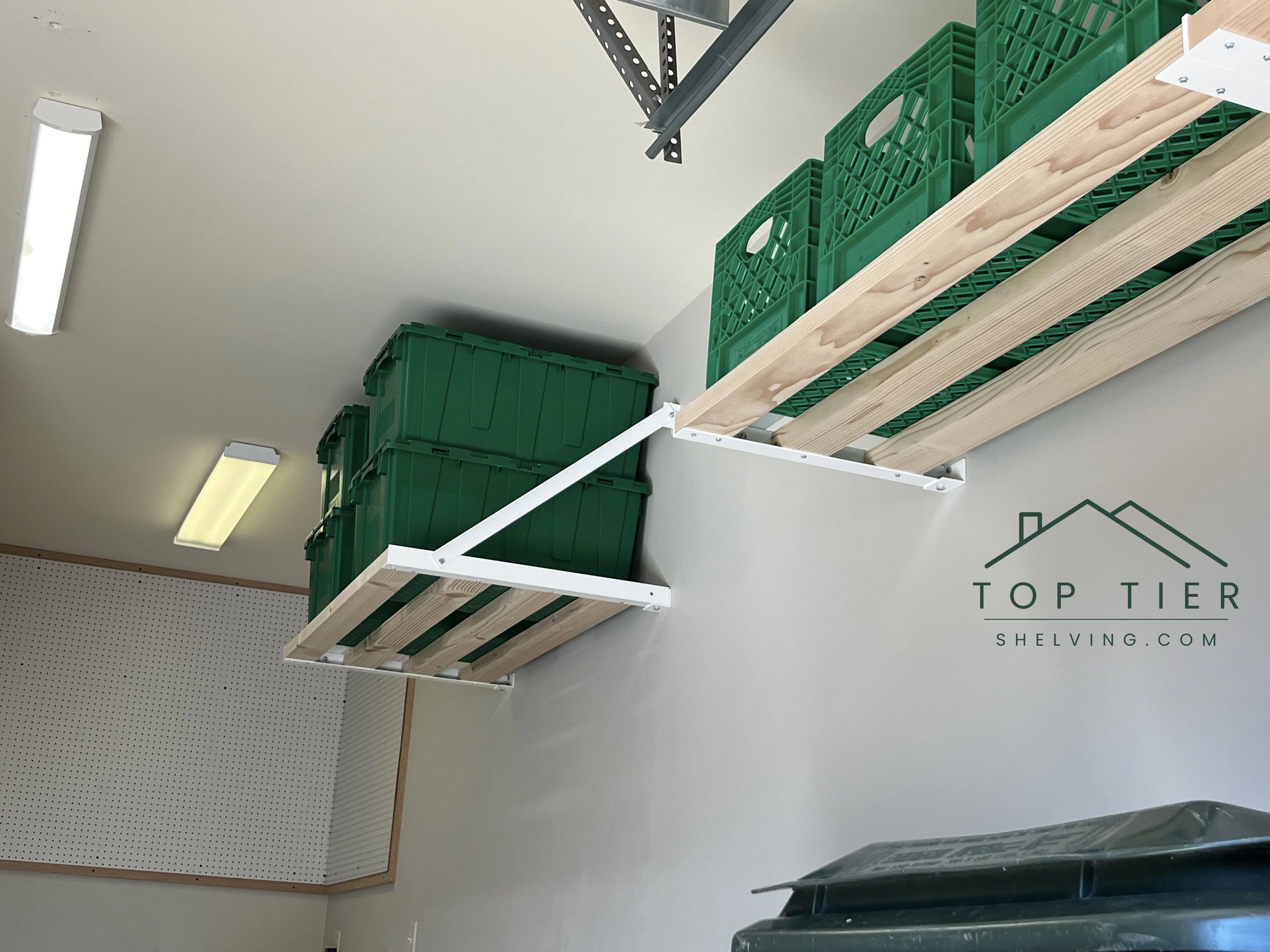 wall mounted garage storage shelving with organized totes in a garner nc garage