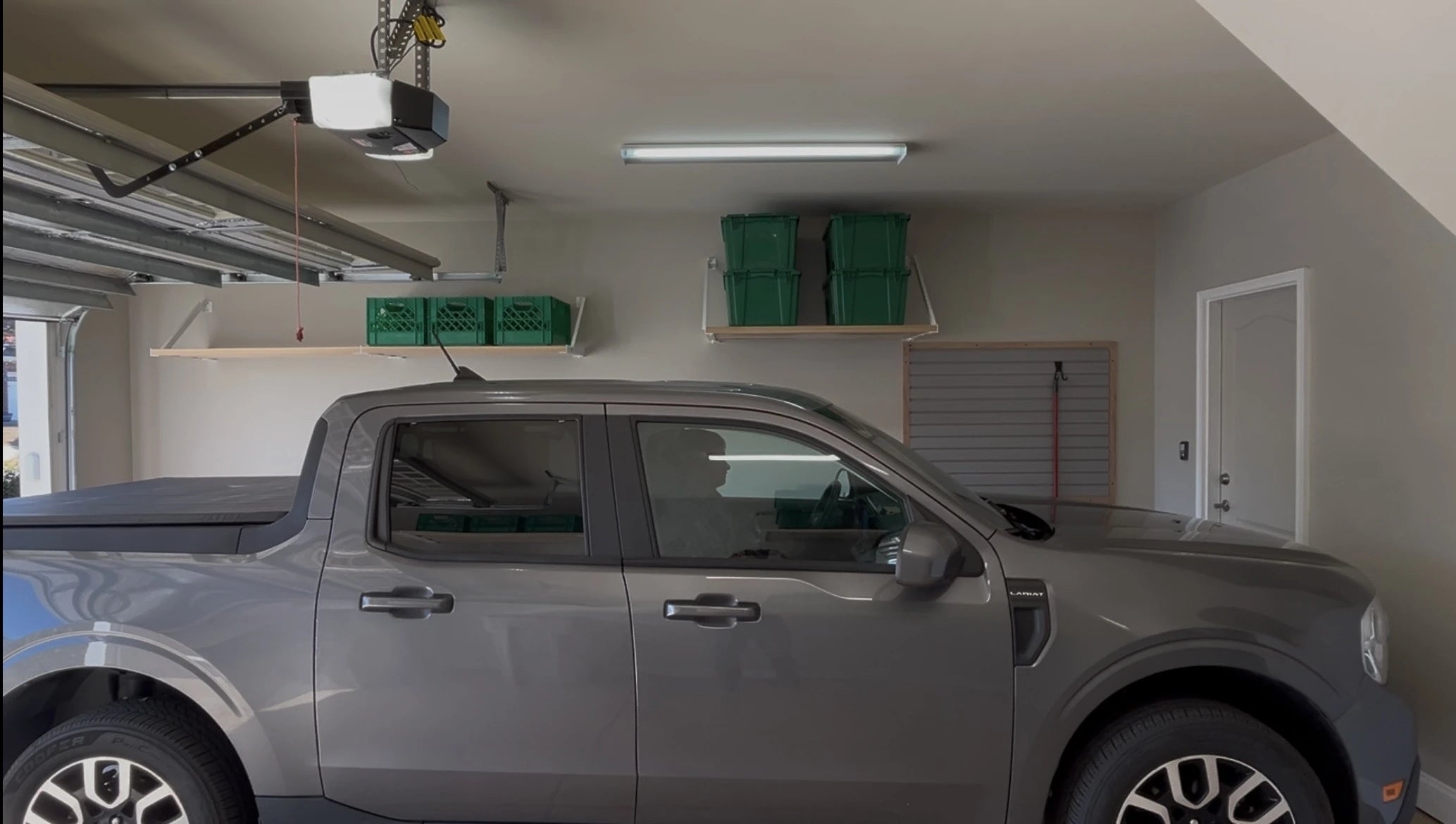 garage shelving to organize and park cars inside again