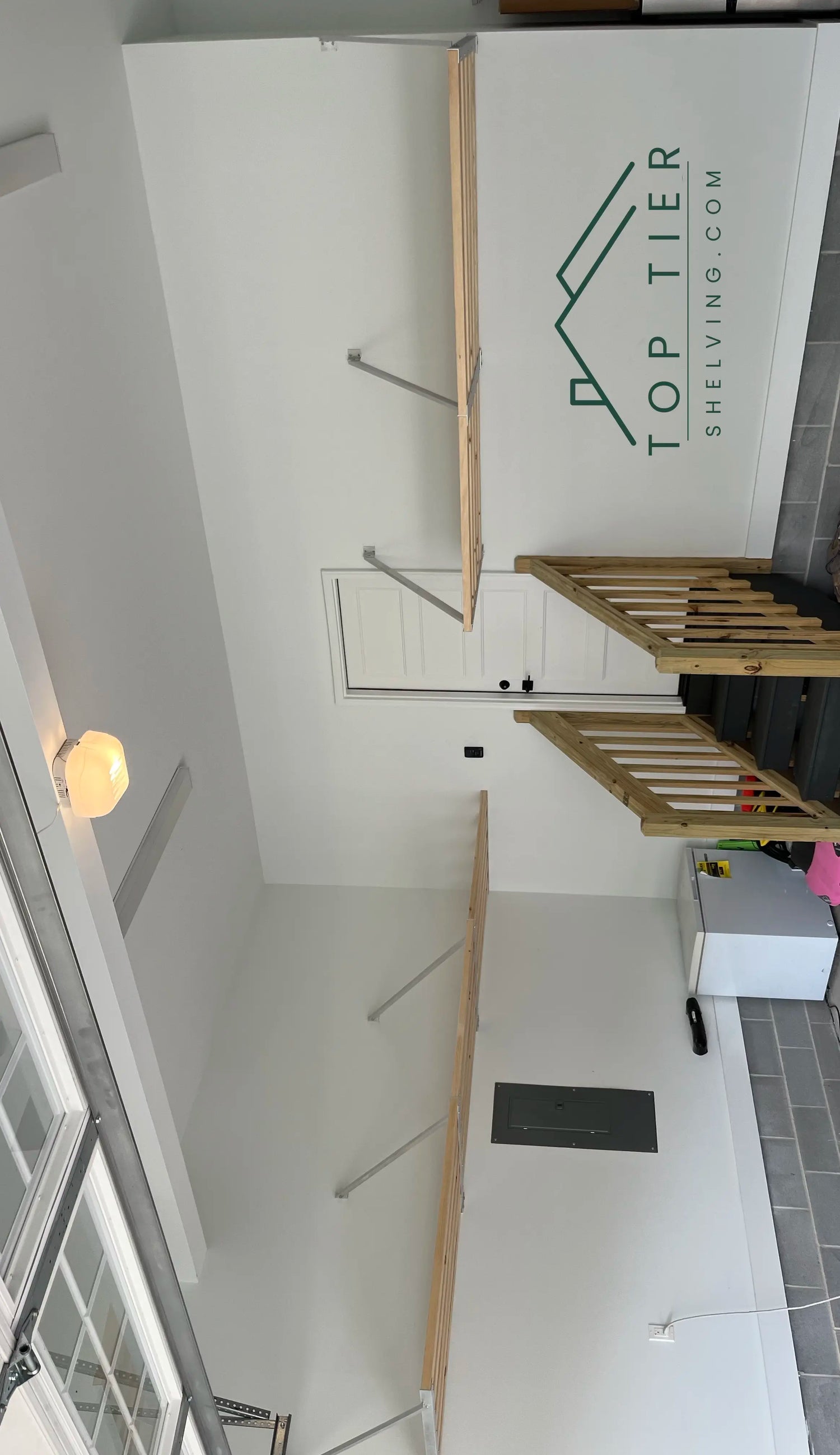 sincere feedback image showing clean garage storage shelving for a large family