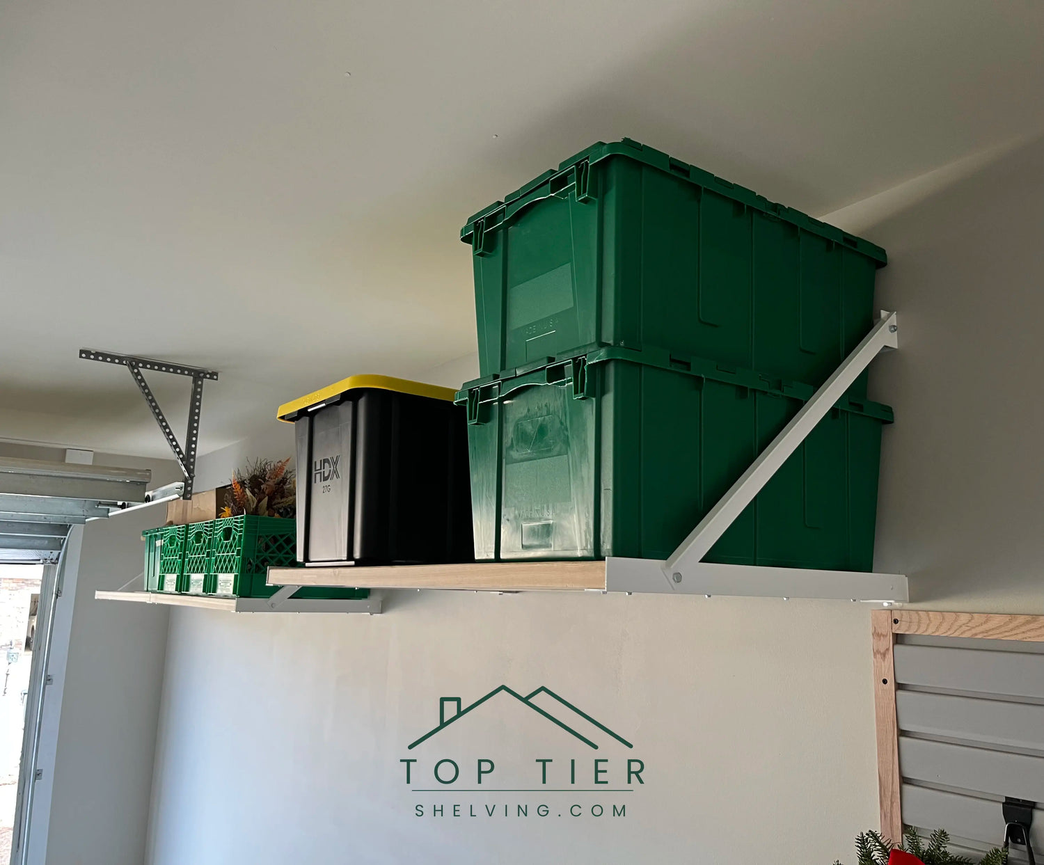 Heavy-duty garage shelving holding plastic bins - 650 lbs capacity per 4-ft section