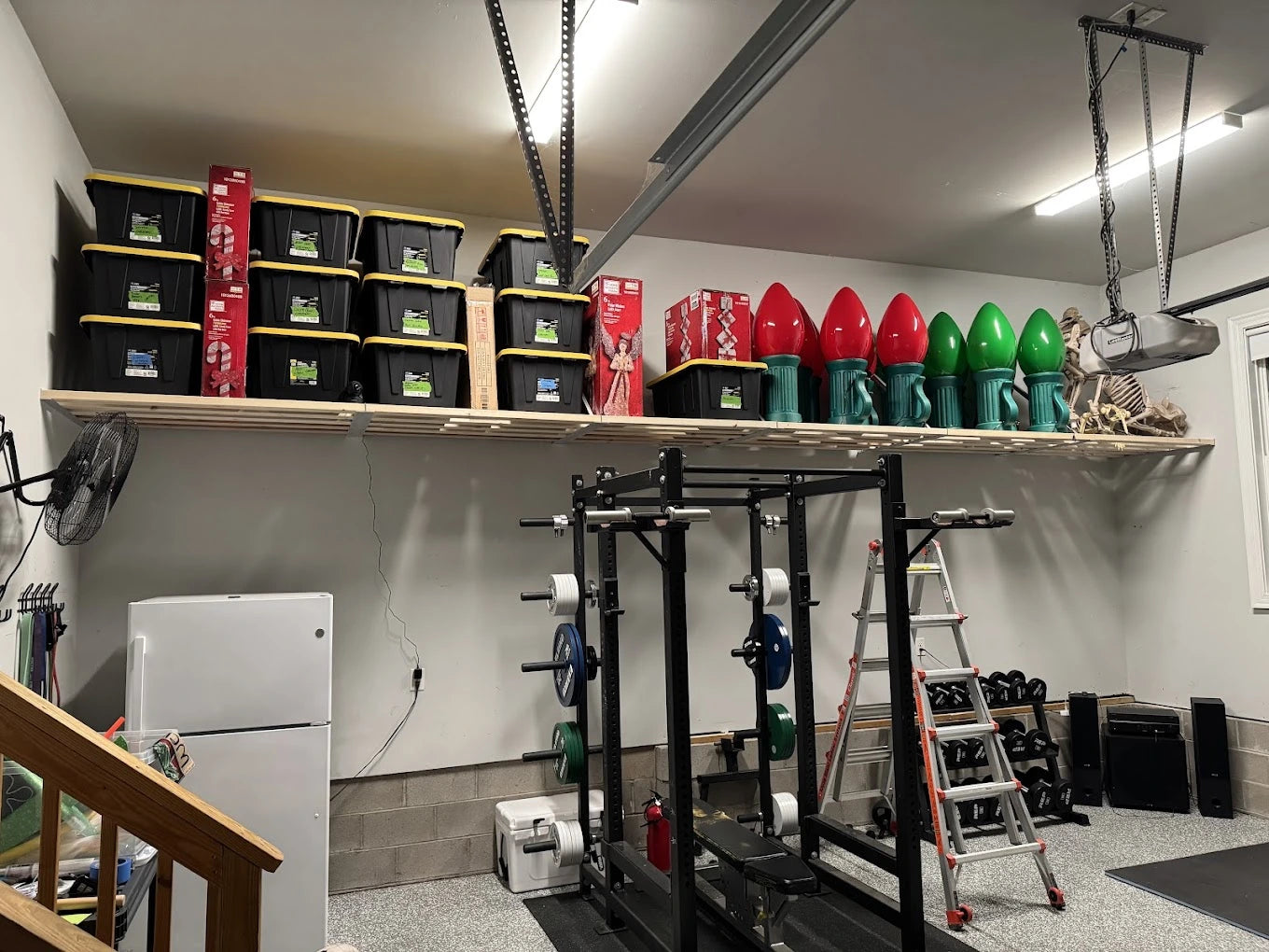 verified customer testimonial image featuring 27-gallon black and yellow storage bins on garage shelving